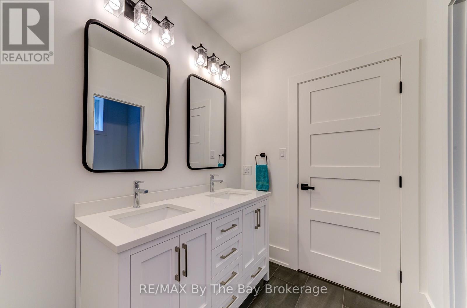 Lower Level Jack and Jill Bathroom - 95 Spruce Street, Tiny, ON