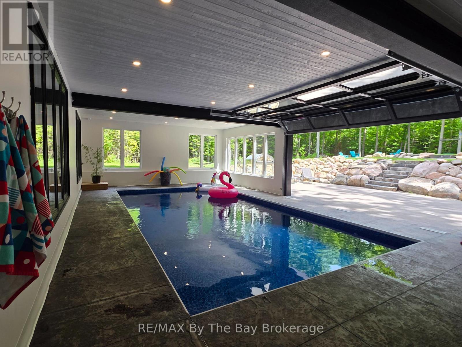 Indoor / Outdoor Pool Oversized Doors Open - 95 Spruce Street, Tiny, ON