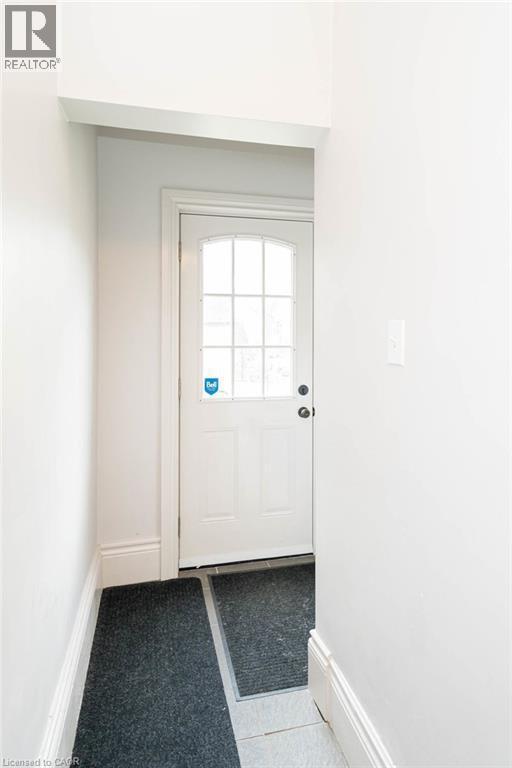 Unit 2 is accessed from Forest Avenue via a private walk-up entrance. - 146 Forest Avenue, Hamilton, ON