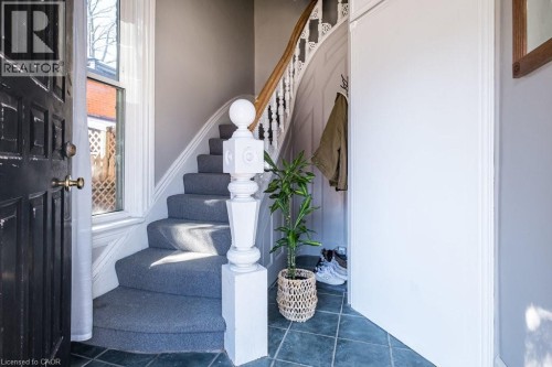 Main floor entrance to the second level unit. All three units feature their own private entrances, offering added privacy and independence for each resident. - 270 Queen Street S, Hamilton, ON 