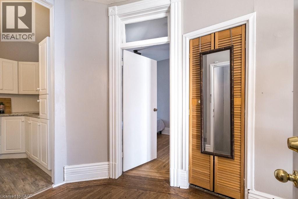 Two convenient closets provide practical storage space and help keep everyday essentials organized. - 270 Queen Street S, Hamilton, ON
