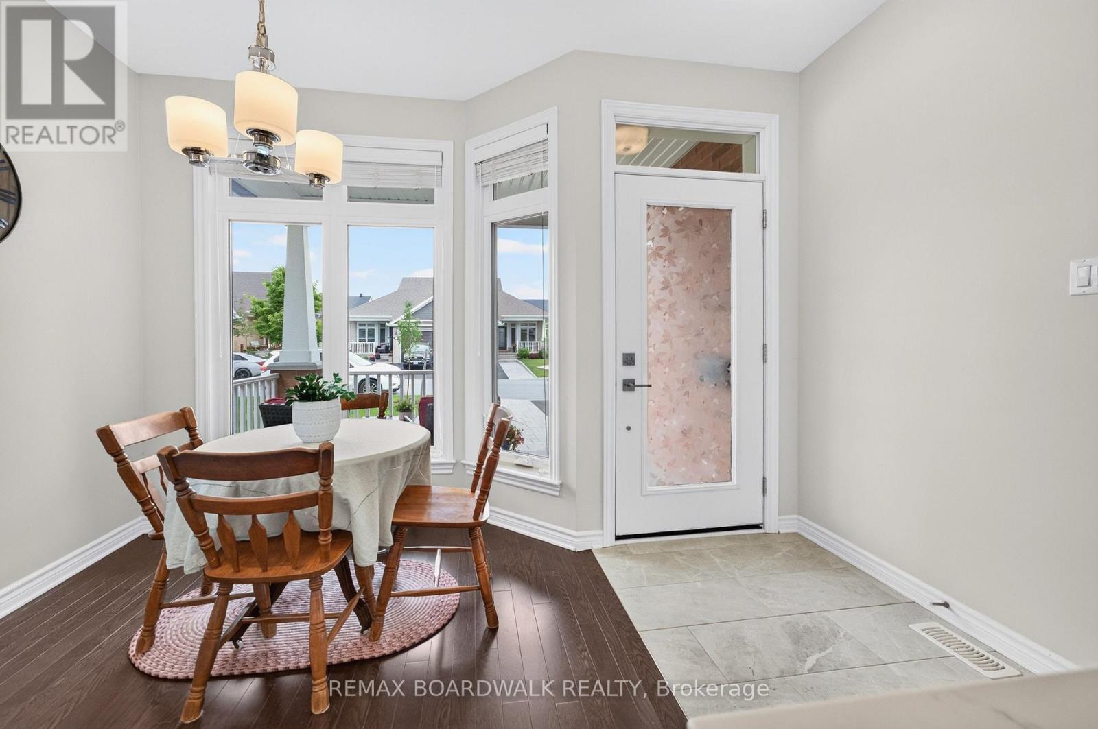 Ceramic Tile & Hardwood floors throughout Main Flr - 224 Maygrass Way, Ottawa, ON - Indoor Photo Showing Dining Room