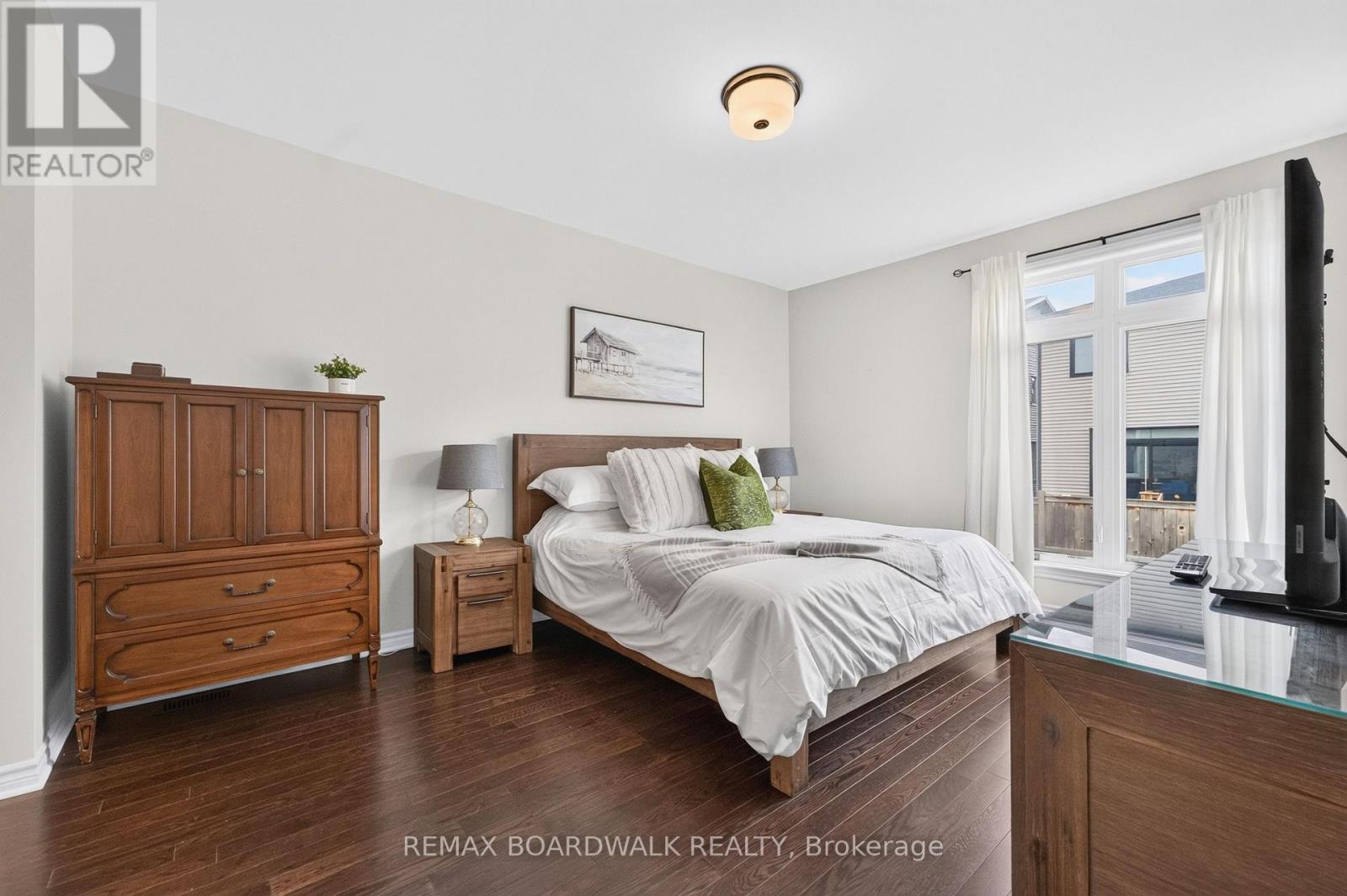 Bright Primary Bedroom w/Hardwood Floors - 224 Maygrass Way, Ottawa, ON - Indoor Photo Showing Bedroom