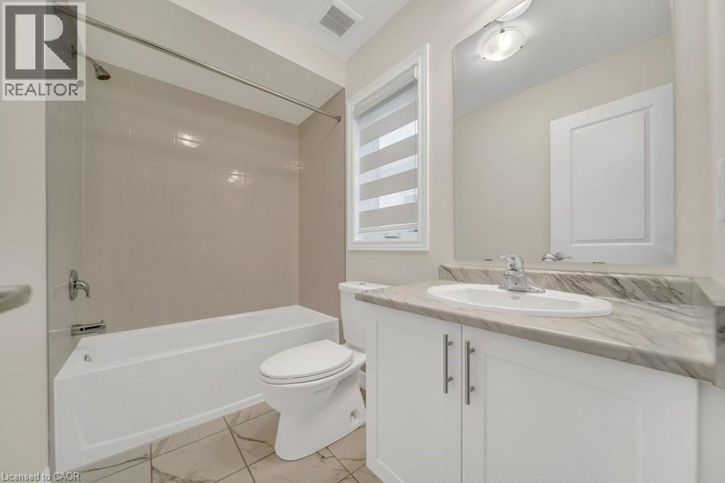 Full bathroom with tub / shower combination and vanity - 285 Broadacre Drive, Kitchener, ON