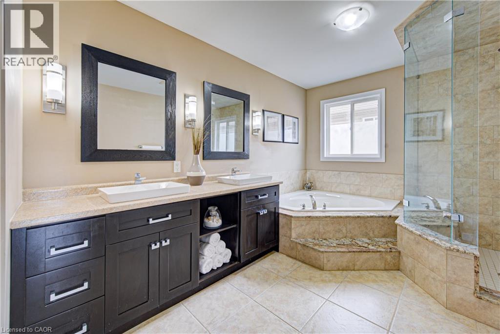 Double vanity with stone countertop and vessel sinks - 37 Davinci Boulevard, Hamilton, ON
