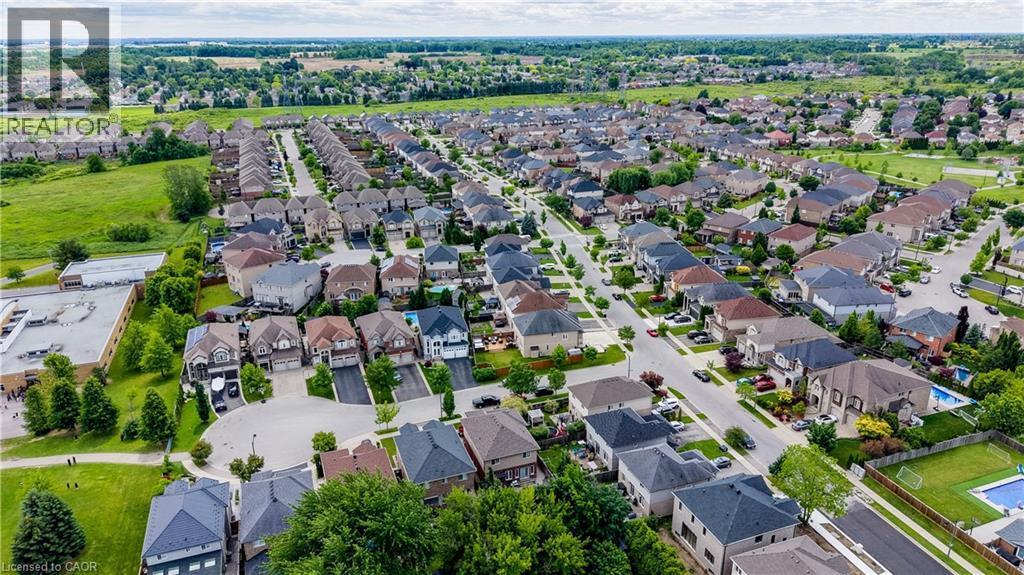 Expansive residential community featuring diverse architectural styles, paved streets, and abundant green spaces - 37 Davinci Boulevard, Hamilton, ON