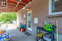 Back covered porch/ rear & lower level entrance -