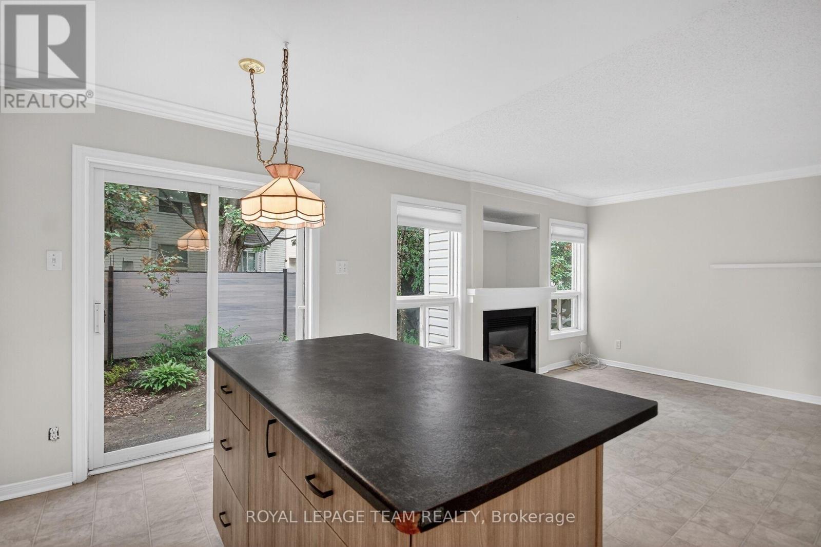 Patio door from kitchen to yard - 19 Windhurst Drive, Ottawa, ON