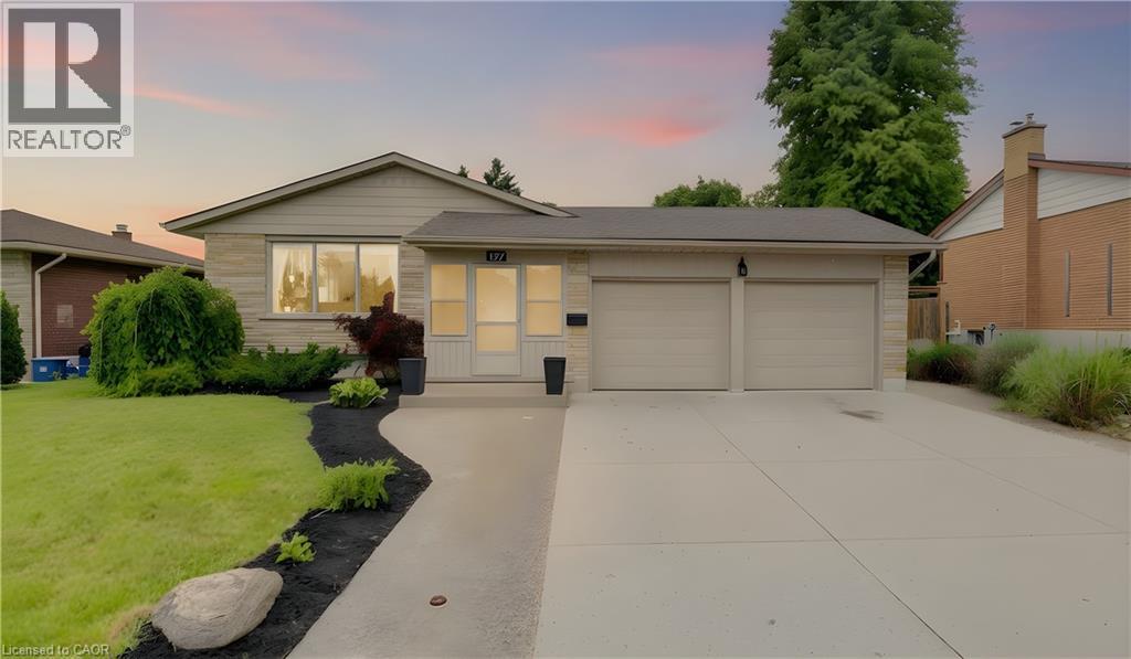 Ranch-style residence featuring stone veneer and horizontal siding - 127 Strathcona Crescent, Kitchener, ON