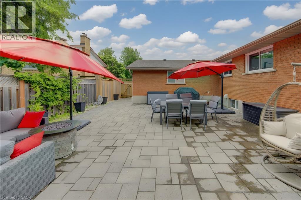 Expansive paver patio offering significant outdoor living space - 127 Strathcona Crescent, Kitchener, ON