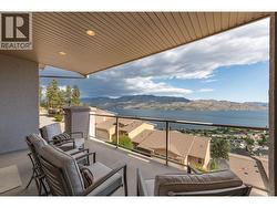 Spacious covered deck with outstanding lake and mountain views! -