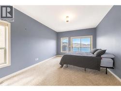 Primary with lake views plus access to private deck -
