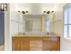 Spacious ensuite with dual vanities, granite counters, soaker tub and shower -
