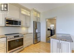 Beautifully updated kitchen with granite counters and stainless steel appliances -