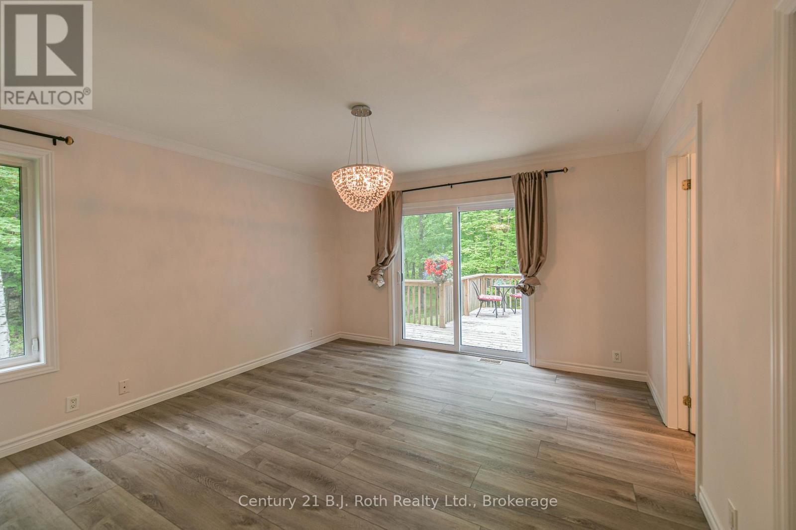 Primary bedroom with walk out to deck - 7463 Davy Drive, Ramara, ON