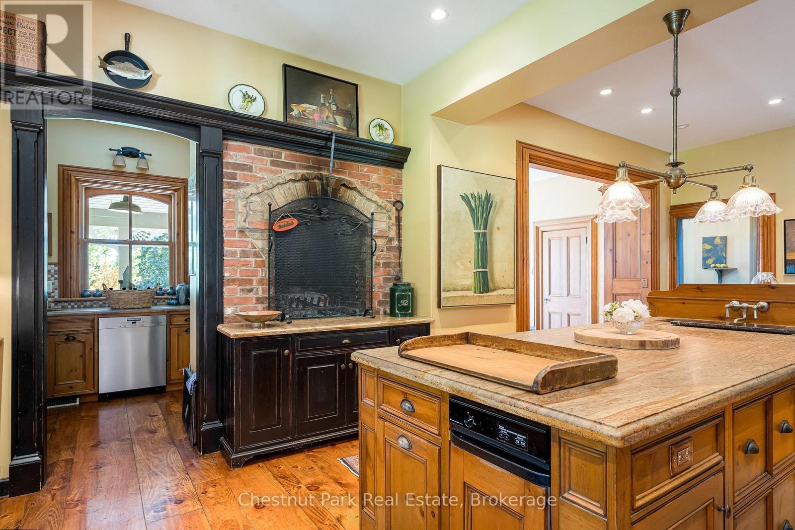 Wood burning fireplace in kitchen - 3554 Concession 3, Clearview, ON