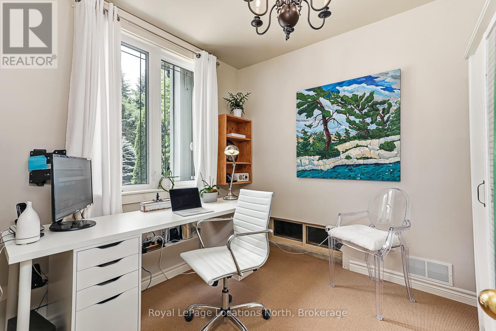 At home office located through the garage - 8366 Poplar Side Road, Clearview, ON - Indoor Photo Showing Office