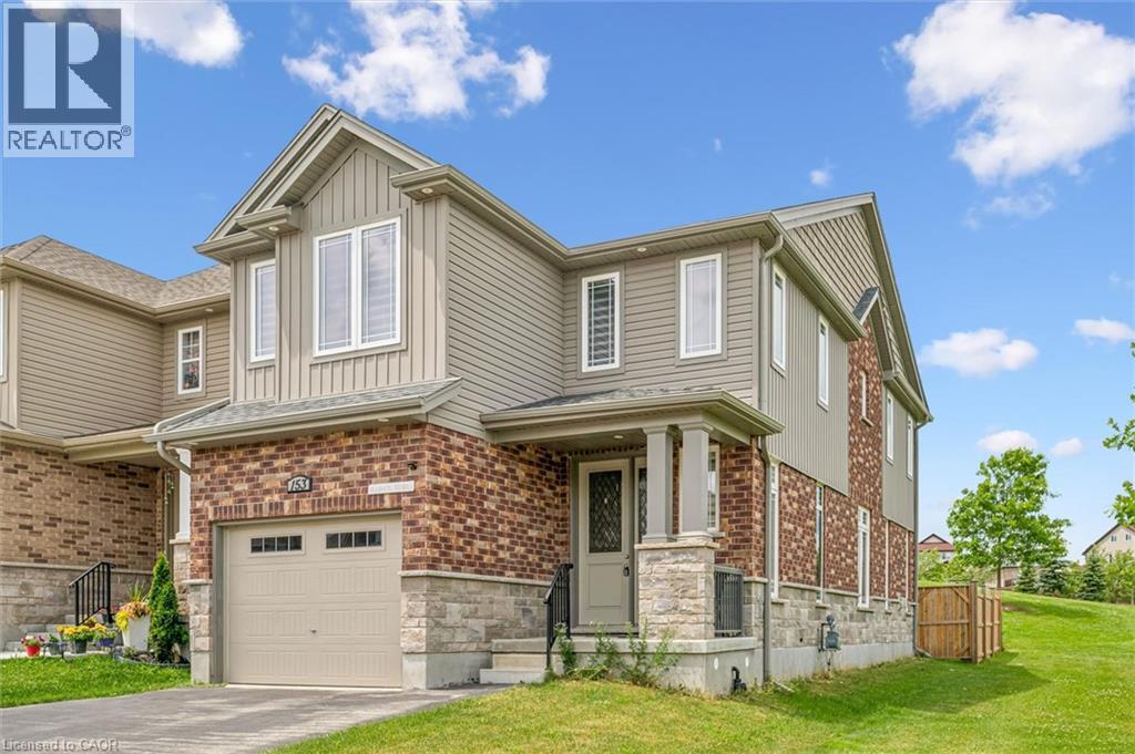 Contemporary two-story residence featuring a brick and stone facade - 153 Rivertrail Avenue, Kitchener, ON - Outdoor