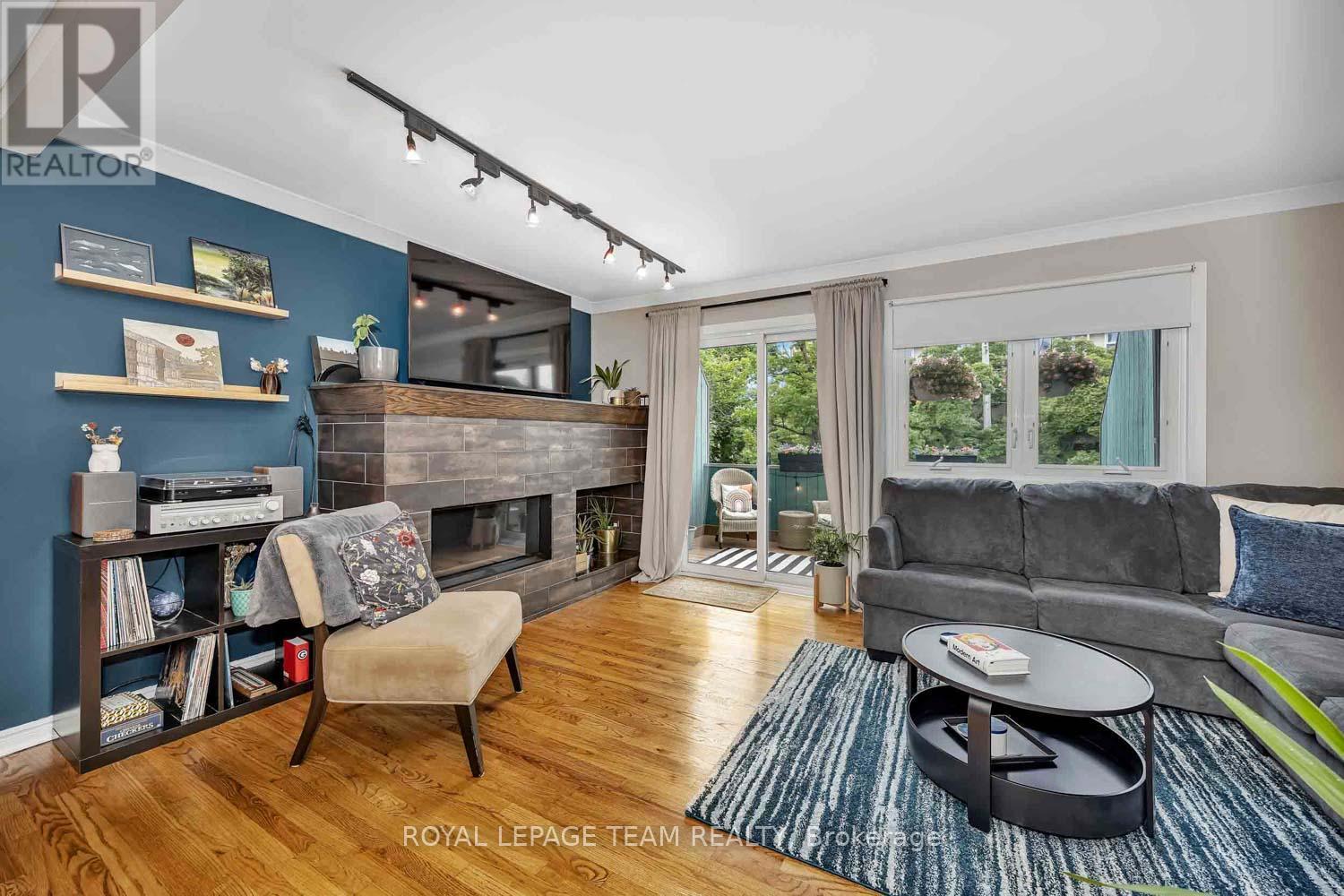 215 Booth Street, Ottawa, ON - Indoor Photo Showing Living Room With Fireplace