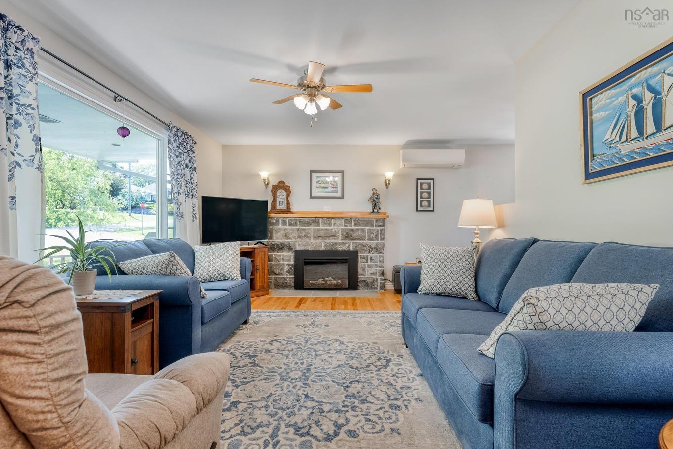 110 Brook Street, Lunenburg, NS - Indoor Photo Showing Living Room With Fireplace