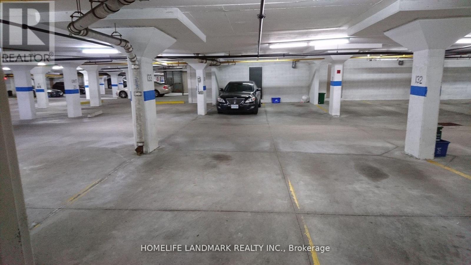 13A - 18 St. Moritz Way, Markham, ON - Indoor Photo Showing Garage