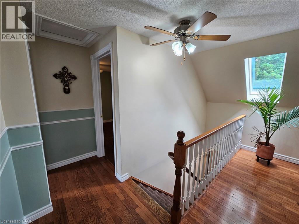 Skylight illuminates the hardwood flooring - 120 Lynndale Road, Simcoe, ON