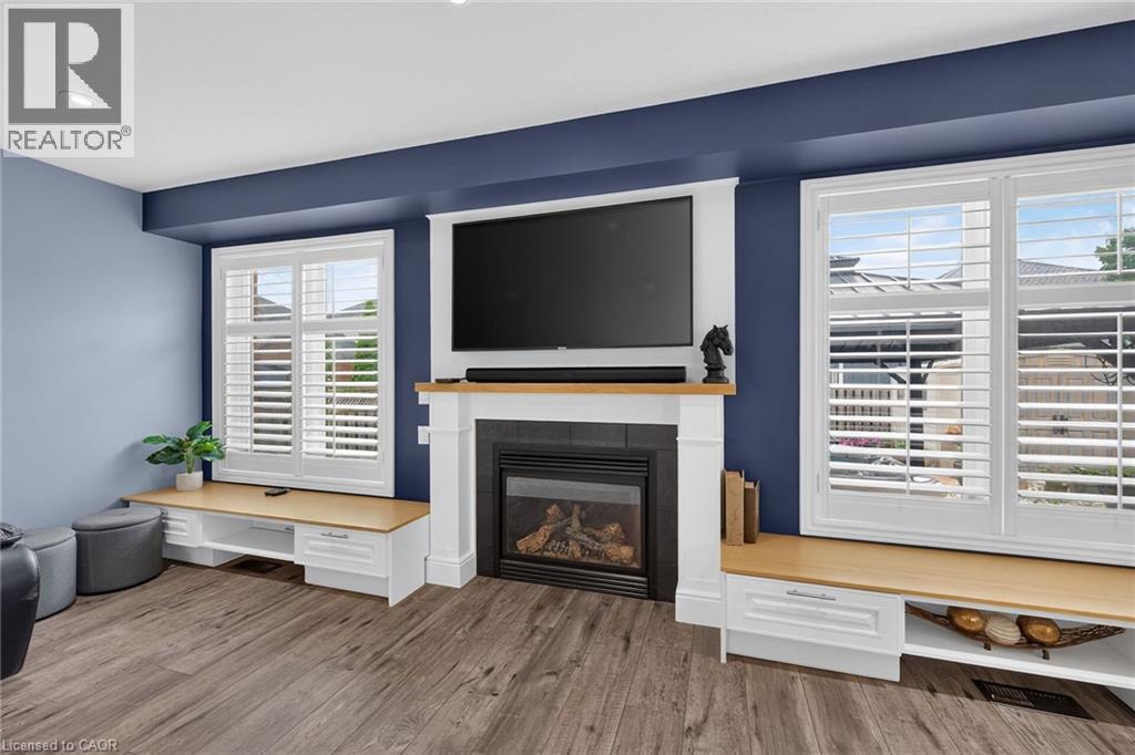 Spacious family room overlooking backyard - 43 Wilbur Drive, Binbrook, ON