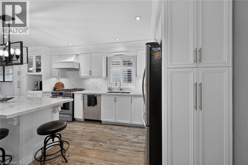 Convenient cupboards throughout. - 43 Wilbur Drive, Binbrook, ON