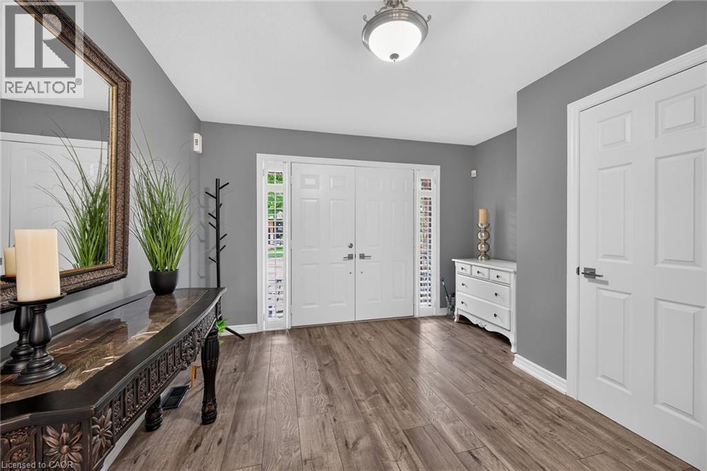 Double doors and large foyer makes welcoming your people a dream! - 43 Wilbur Drive, Binbrook, ON