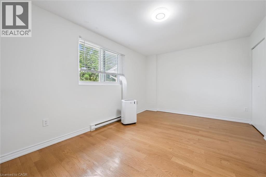 Spacious bright bedroom with air conditioner - 178 Westcourt Place, Waterloo, ON
