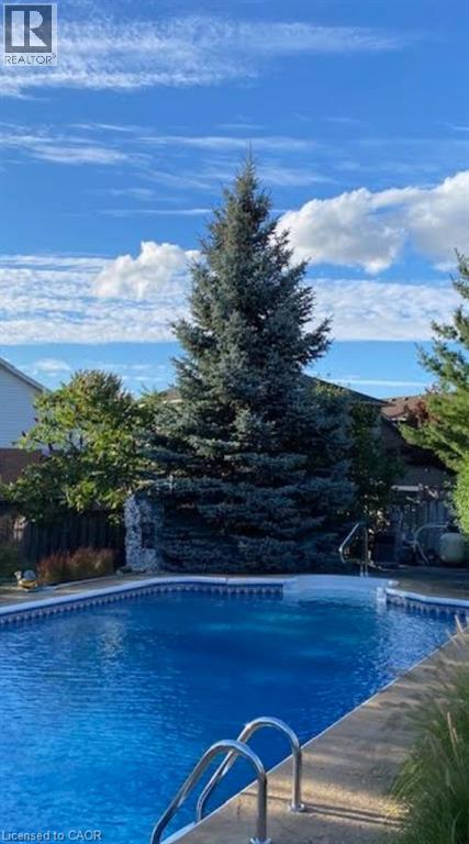 84 Jamieson Drive, Caledonia, ON - Outdoor With In Ground Pool With View