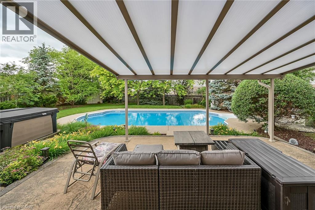 84 Jamieson Drive, Caledonia, ON - Outdoor With In Ground Pool With Deck Patio Veranda