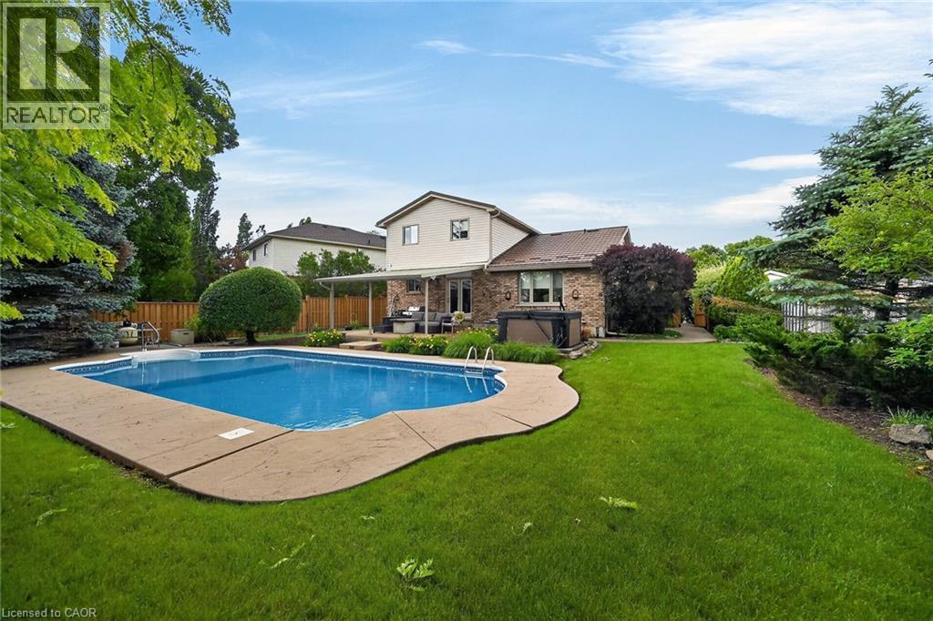 84 Jamieson Drive, Caledonia, ON - Outdoor With In Ground Pool With Deck Patio Veranda With Backyard