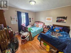 Upper Unit Bedroom 1 -