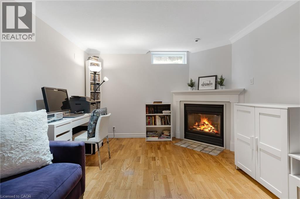 Corner fireplace with white mantel - 139 Dorset Road, Cambridge, ON