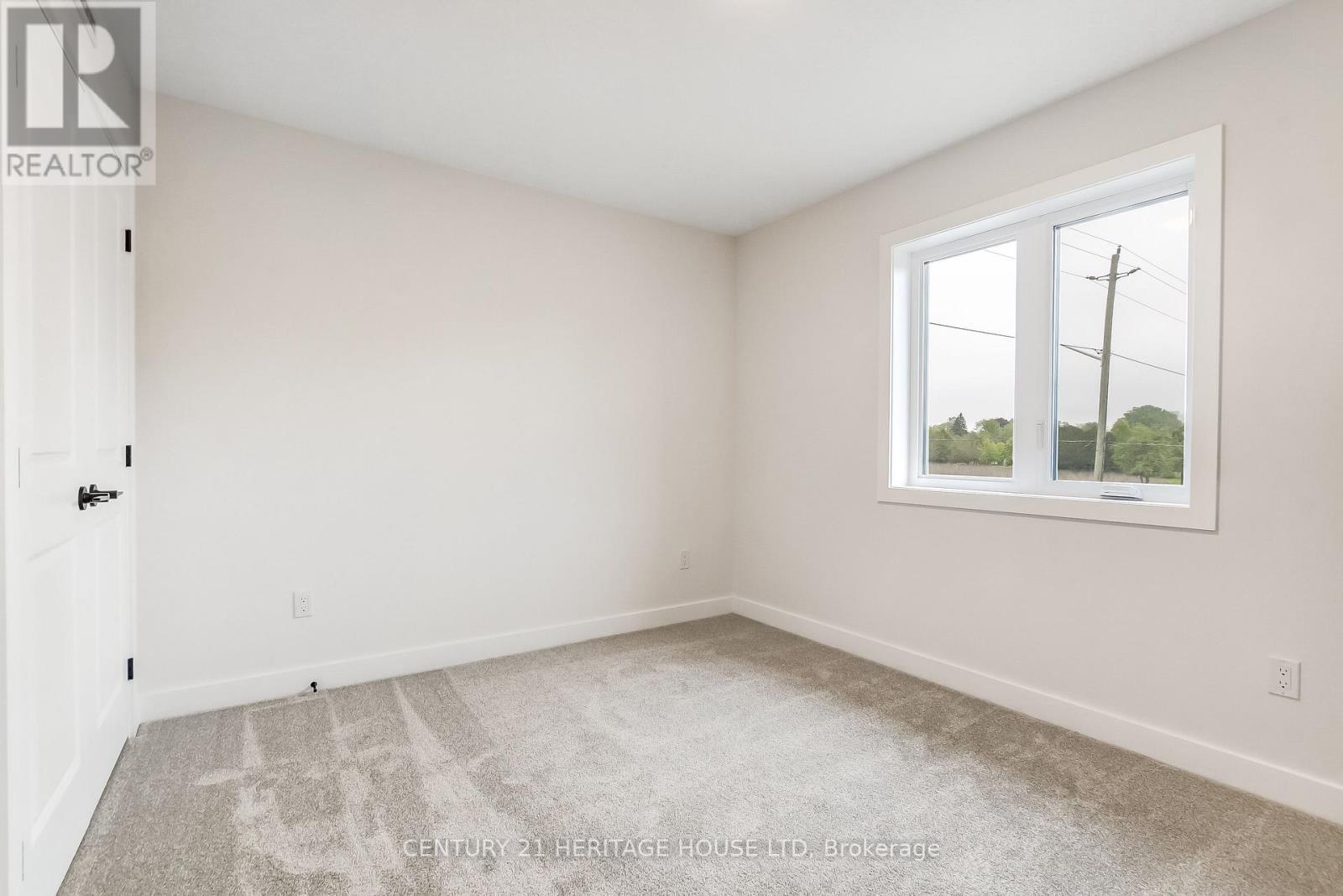 36 Hawks Gate, Central Elgin, ON - Indoor Photo Showing Other Room
