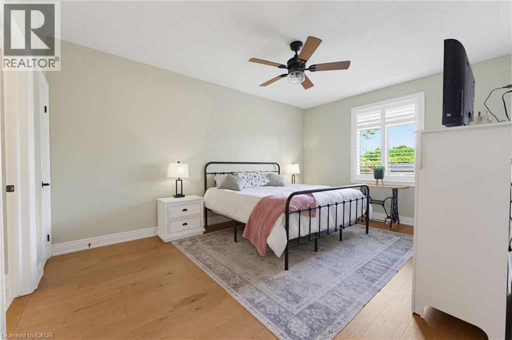Spacious primary bedroom, large windows to watch the stars at night - 131 Craddock Boulevard, Haldimand, ON