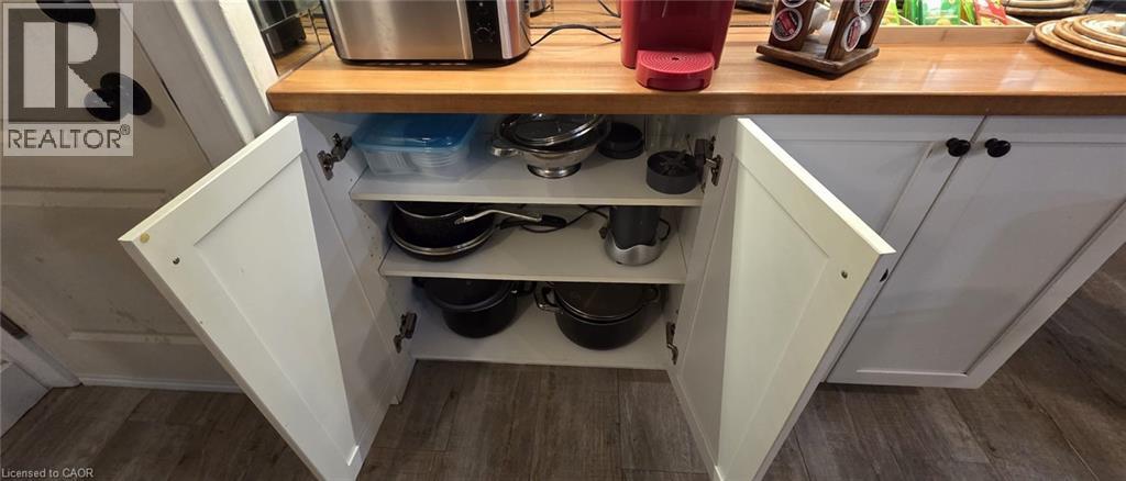 White base cabinetry with a solid wood countertop - 134 Bridgeport Road E Unit# Upper, Waterloo, ON