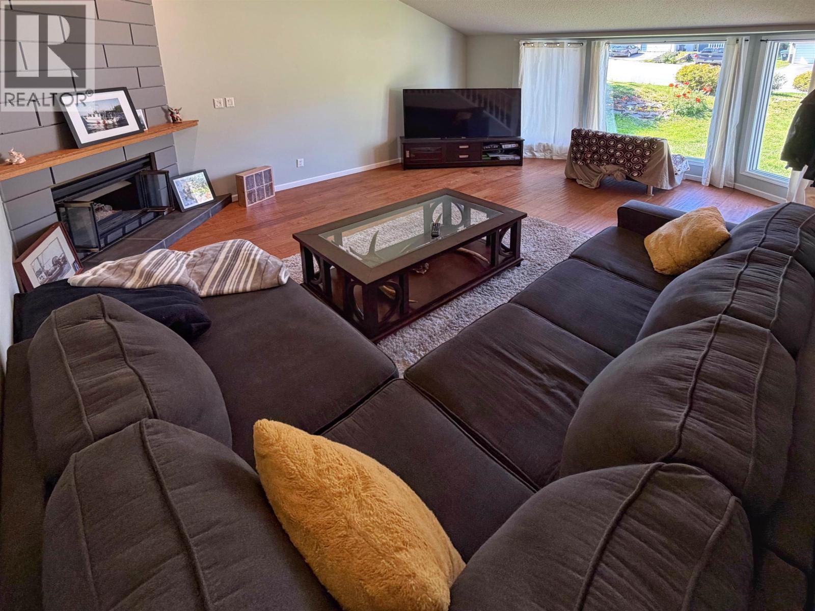 1228 E 7Th Avenue, Prince Rupert, BC - Indoor Photo Showing Living Room With Fireplace