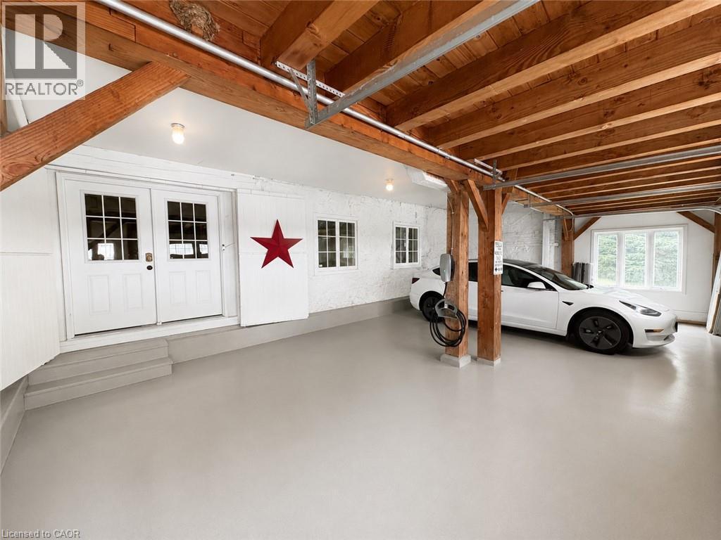 Garage Entry - 6115 Guelph Line, Burlington, ON - Indoor Photo Showing Garage