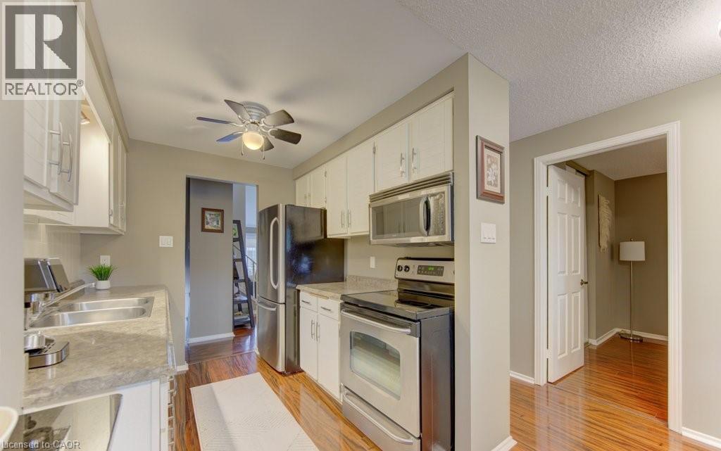 458 Beechwood Place Unit# 3, Waterloo, ON - Indoor Photo Showing Kitchen With Double Sink