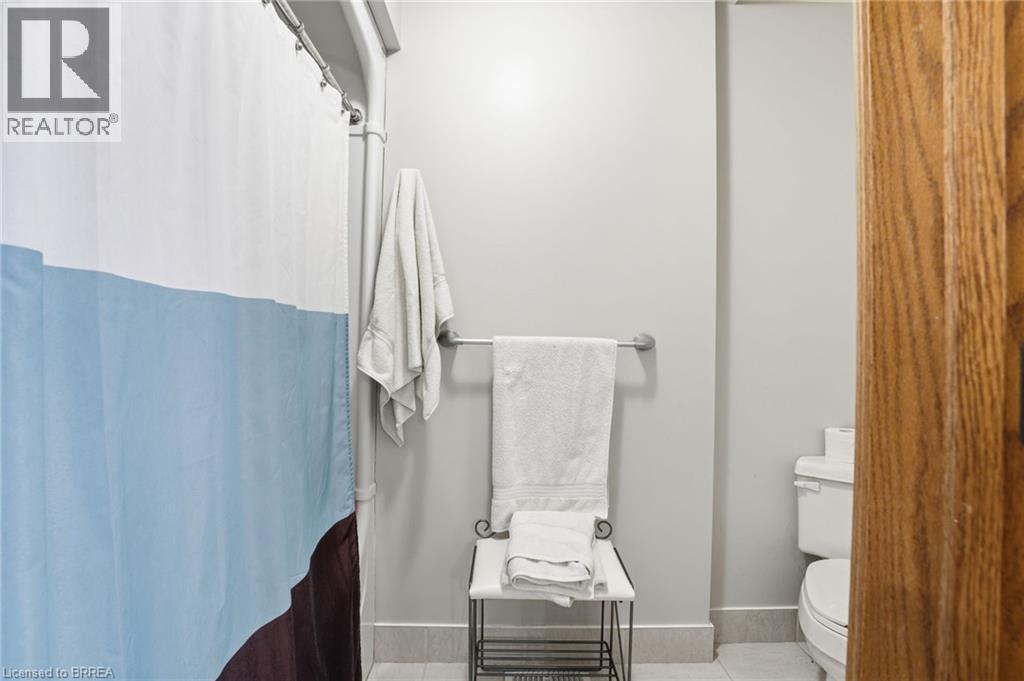 Bathroom with light gray walls and a tile floor - 271 Windham Rd 14, Simcoe, ON