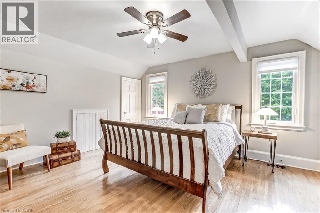 Upstairs you will find 2 bedrooms, both large with some original features. - 59 Decou Road, Simcoe, ON