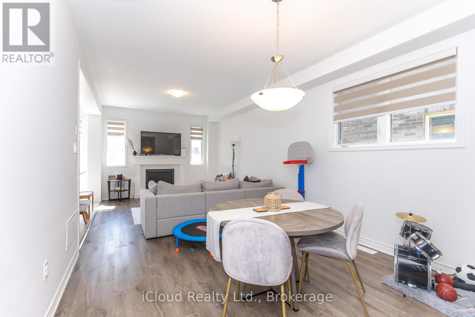 302 Calla Point, Milton, ON - Indoor Photo Showing Other Room With Fireplace