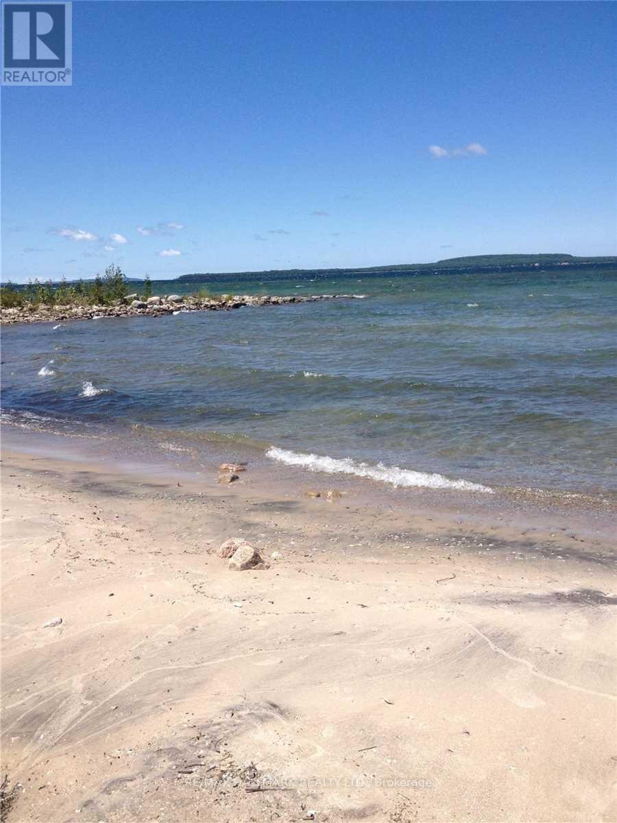 Walk to The Beaches at Sawlog Bay - 10 Musquake Court, Tiny, ON - Outdoor With Body Of Water With View