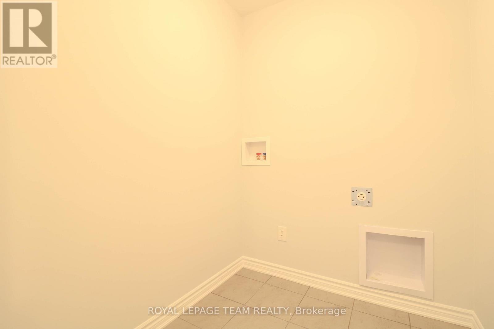 Washer and dryer has been installed in unit - 524 Culdaff Road, Ottawa, ON - Photo Showing Other Room