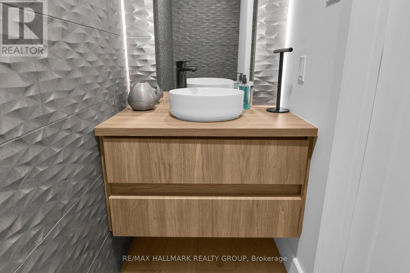 Main Level - Powder Room with wave tile - 2167 Rice Avenue, Ottawa, ON - Indoor Photo Showing Bathroom