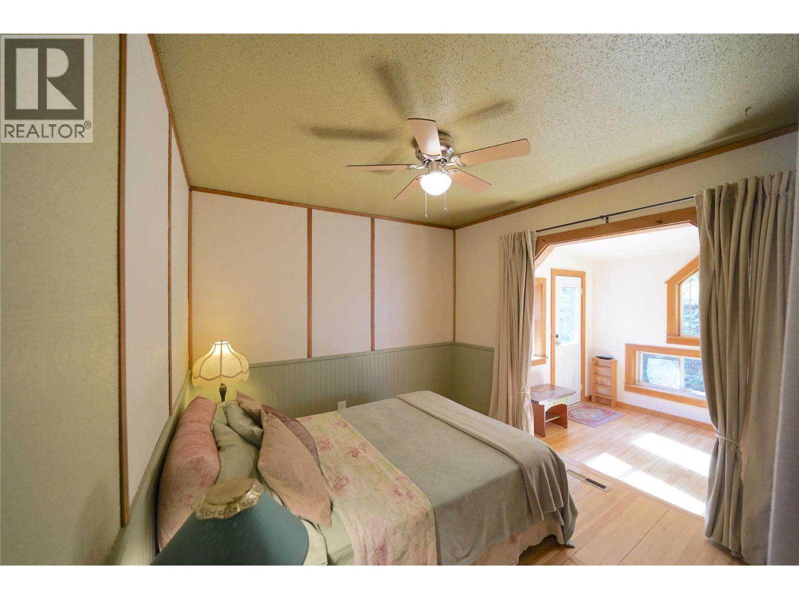281 Iwanik Road, Procter, BC - Indoor Photo Showing Bedroom