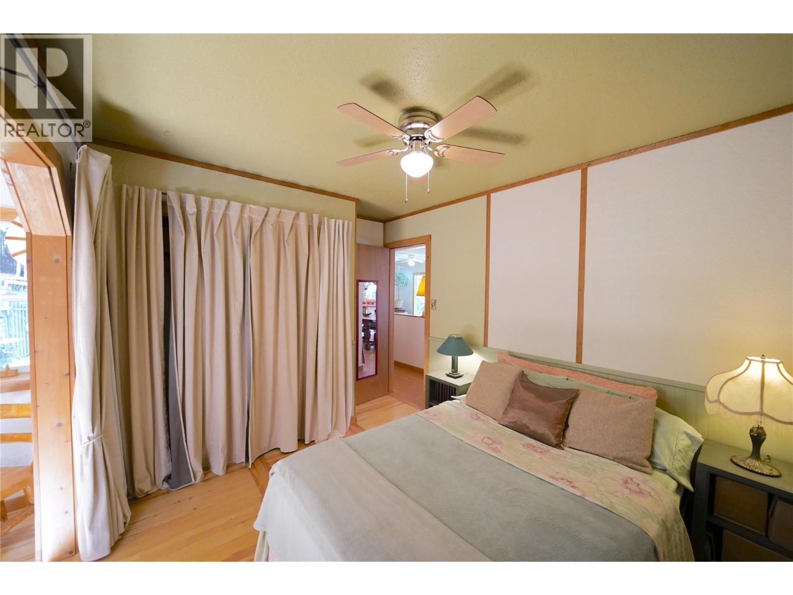 281 Iwanik Road, Procter, BC - Indoor Photo Showing Bedroom