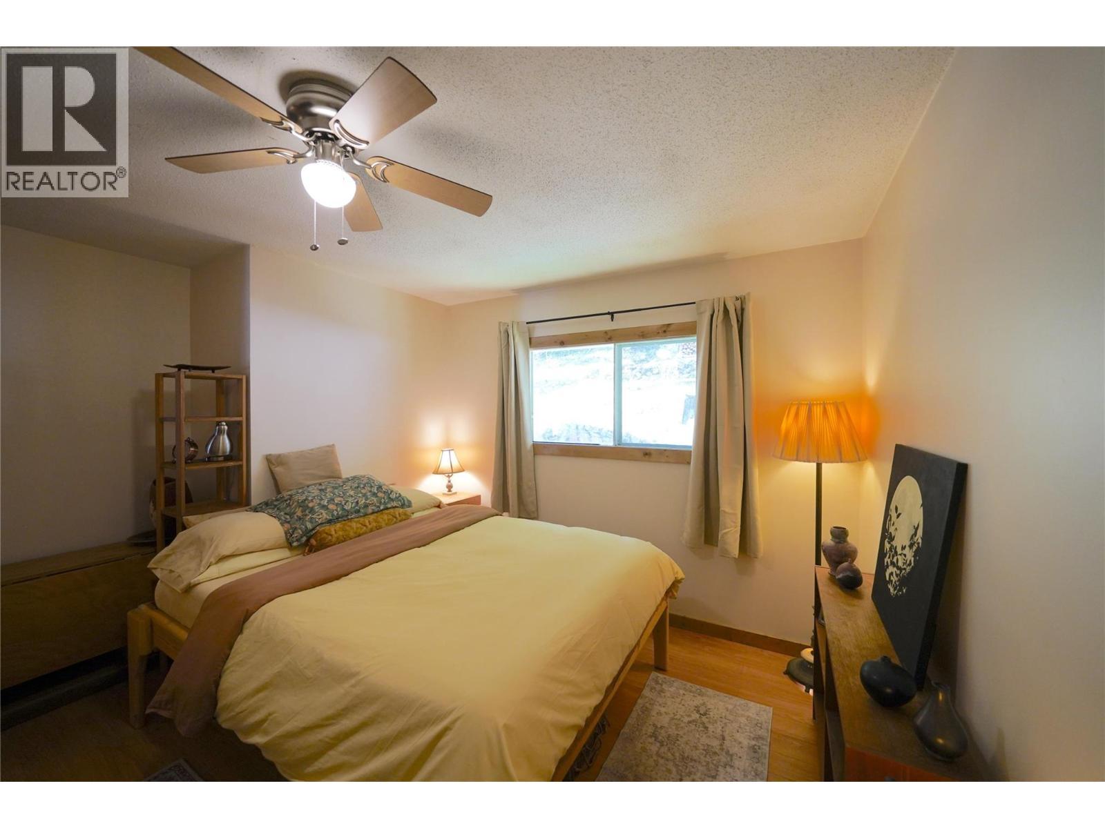 281 Iwanik Road, Procter, BC - Indoor Photo Showing Bedroom